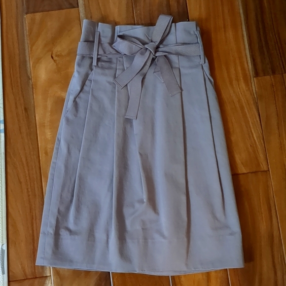 Taluka Baton. Size 2. Thigh length skirt with pockets. Like new condition. - Picture 1 of 4